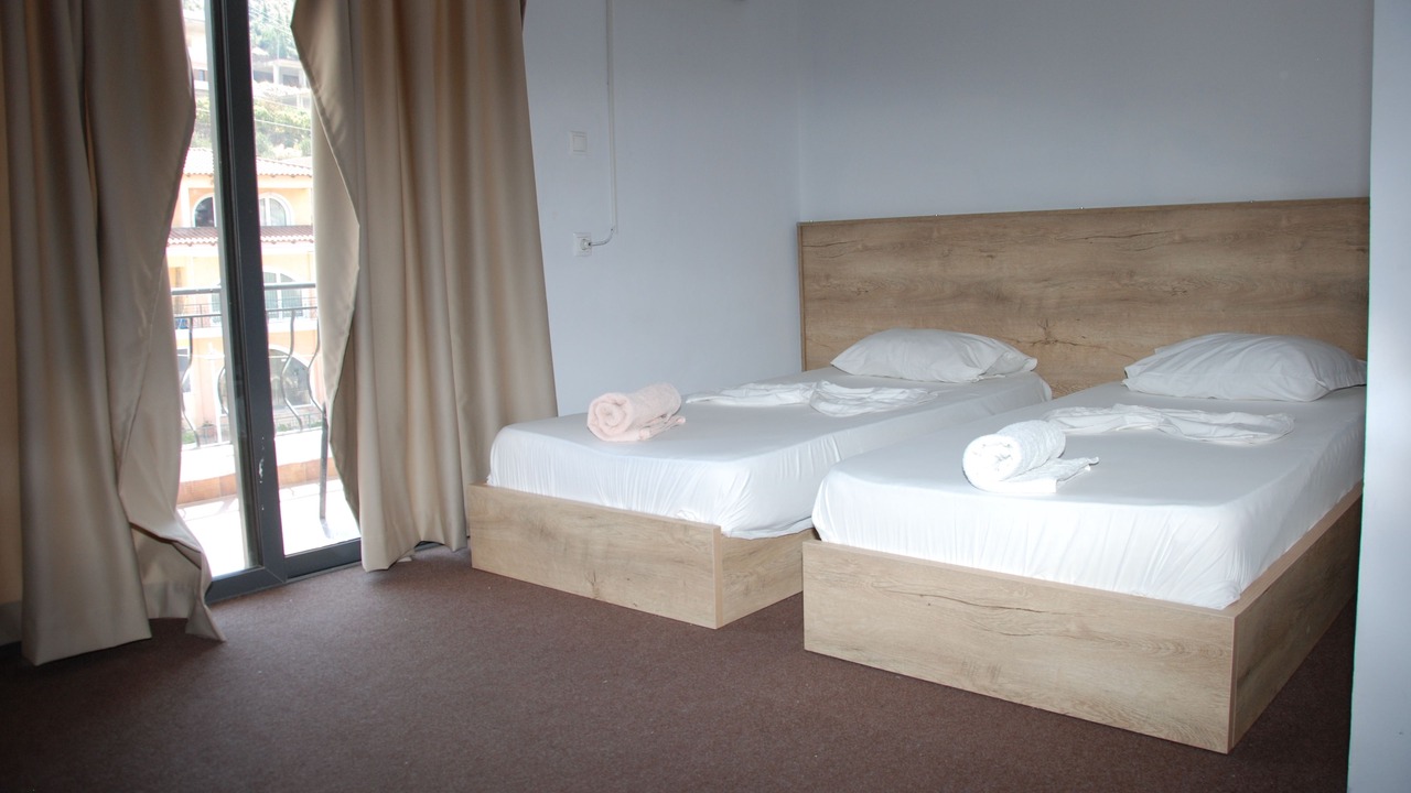 Photo of Bedroom in Qafe e Gjashtes