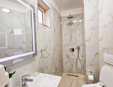 Quadruple Room with Private Bathroom