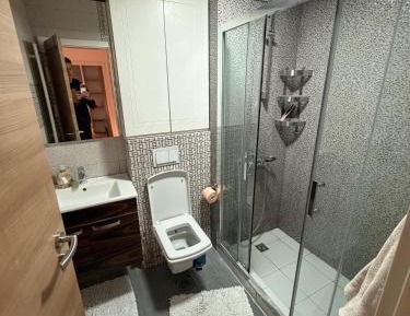 Three-Bedroom Apartment with Balcony