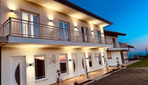 One-Bedroom Apartment with Balcony and Sea View