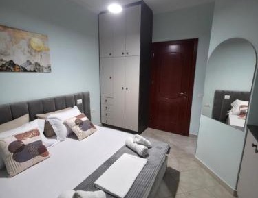 One-Bedroom Apartment with Balcony and City View