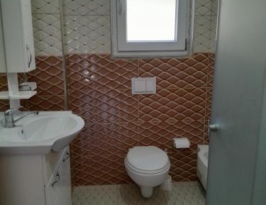 Basic Triple Room with Shared Bathroom