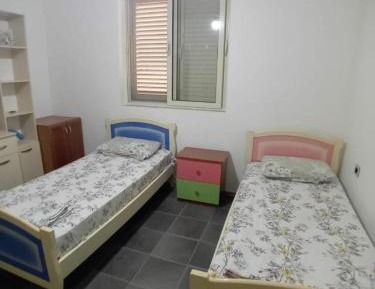 Single Bed in Dormitory Room
