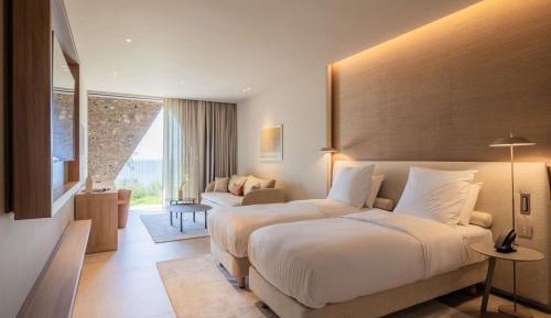 Deluxe Room with Two Twin Beds and One Sofa Bed