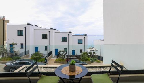 One-Bedroom Apartment with Balcony and Sea View