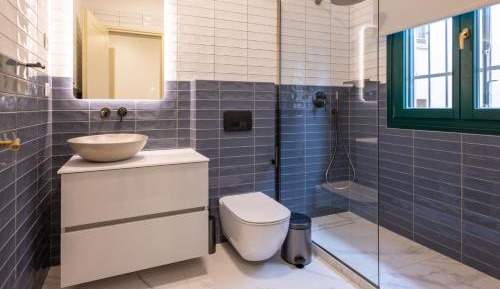 Room 3- Queen Double Room with window overlooking at adjacent building