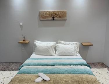 One-Bedroom Apartment with Balcony and City View