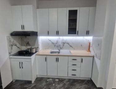 Three-Bedroom Apartment with Balcony