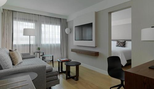 One Bedroom Suite with King Bed and Courtyard View
