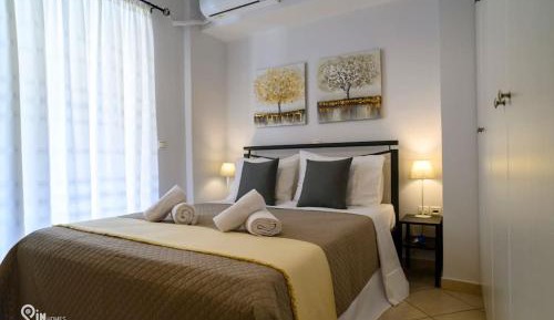 One-Bedroom Apartment with Balcony and City View