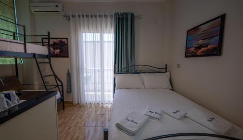 Quadruple Room with Side Sea View