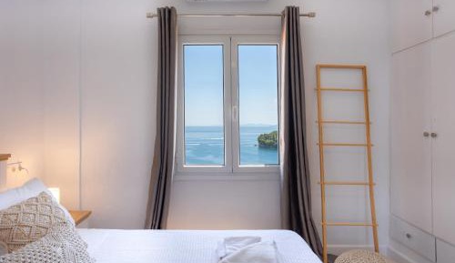 Deluxe Top Floor Two-Bedroom Apartment With Balcony & Sea View
