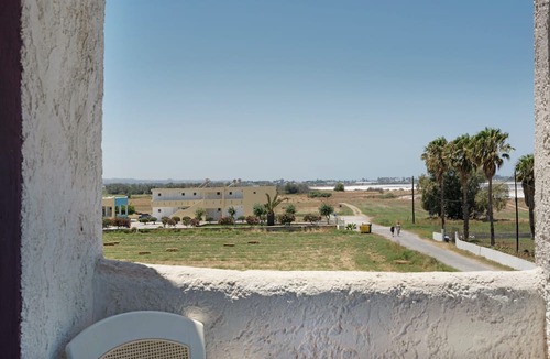 Tingaki Apartment | Studio Apartment 'Golden Sun 9' with Sea or Garden View, Shared Pool and Wi-Fi