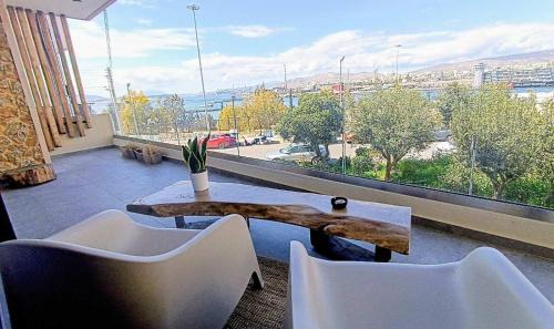 Piraeus Apartment | "Naias"seaside residence in the port of Piraeus-entire holiday home