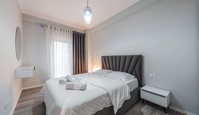 The Teal Spot by PikHost in Tirana