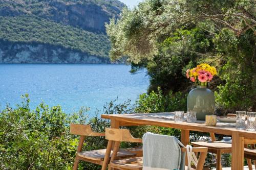 Sea Whisper Beachfront villa reached only by boat in Mikros Gialos