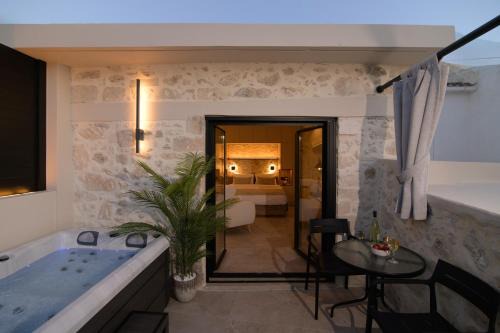 Lithos Luxury Stone Home with jacuzzi in Kiriánna