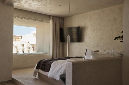 Uzenie All Suites Boutique Resort - Adults Only in Adelianos Kampos